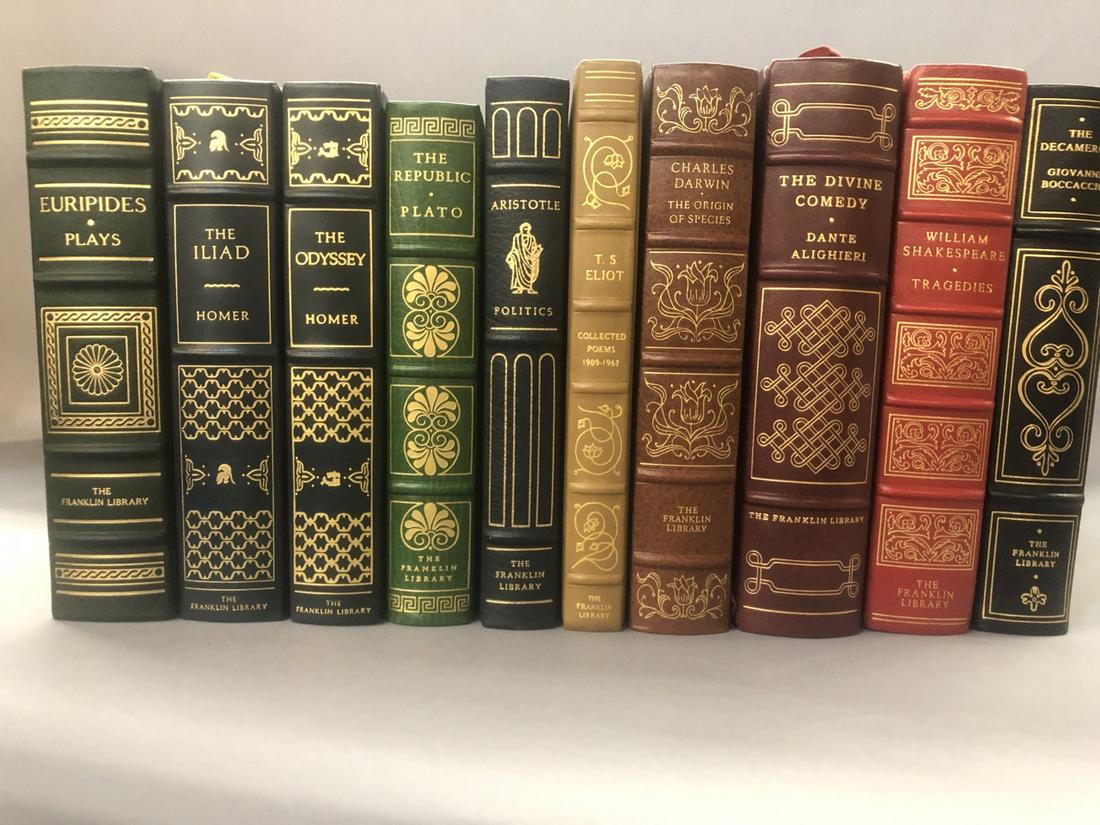 Franklin Library Leather Bound Books: Franklin Library leather bound books. Ten pieces including Euripes, The Iliad, The Odyssey, Plato, Aristotle Politics, T.S. Elliot Poems,The Origin of Species, The Divine Comedy, Tragedies and The Dec