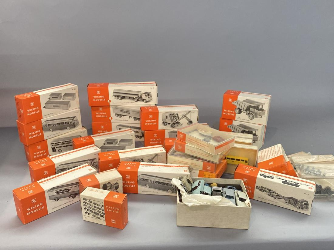 Wiking Modelle HO New Old Stock Collection: 50 pieces total new old stock train set up vehicle models. Trucks, cars etc. 1:87 HO scale and 1:160 scale. Made In Germany.Condition report: Very good, all brand new condition in boxes. Please see ph
