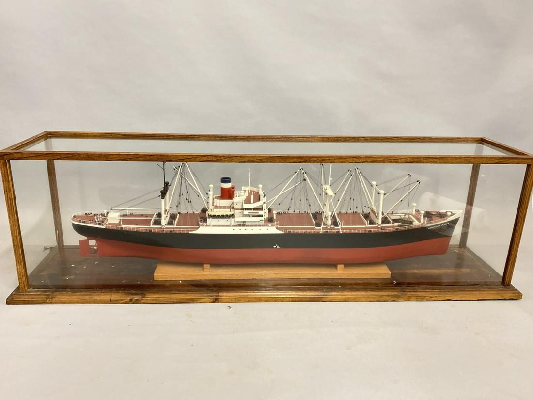 American Scout Ship Model 4ft Length: A fine American Scout ship model housed in oak and glass case.Dimensions: 18 inches height x 59 1/2” width (almost 5 feet total)