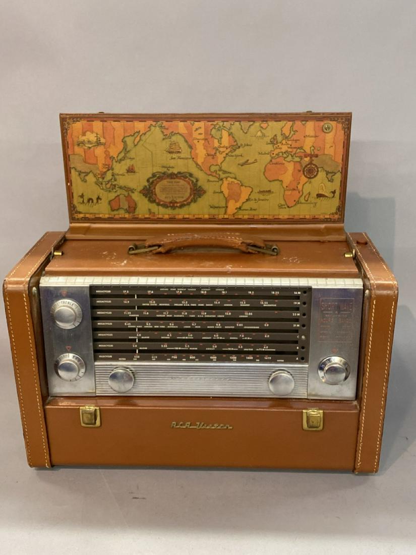 RCA Victor Short Wave Radio Model BX-671: RCA Victor short wave worlds radio model three Dash BX- 671 serial number 034637.Condition Report: Very good, some scratching and minmal wear to cowhide casing. Working order. Please see photograph pr