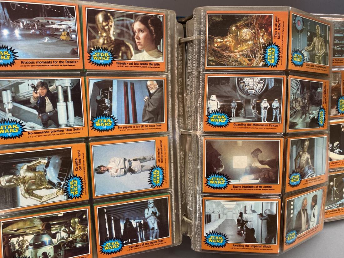 592 Approx. Star Wars Trade Card Album: A large album with a nice collection of Star Wars and Close Encounters trade card. I would catergorize this as extensive and in fine condition with almost 600 cards total in book. (596)
