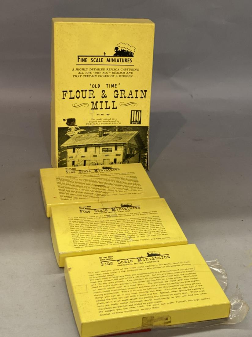 Fine Scale Miniature, HO Scale: HO scale models by Fine Scale Miniatures, Peabody Massachusetts Flour & Green Mill kit number 40 and three boxes of precision metal castings.