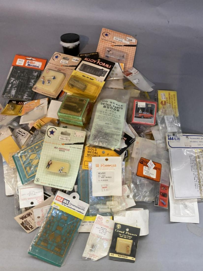 100+ New/Old Stock HO Model Accessories Lot: 100 + Packages HO scale accessories parts new old stock in packages. Brass, scale structures limited, crow river, arrow CO, MAGNUSON, Plastex etc.