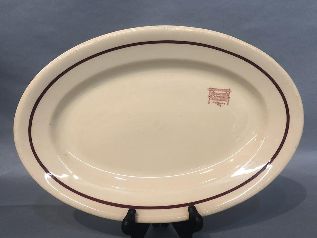 Scheulpeiu’s Montgomery NY Dinner Plate.: Scheulpeiu's Montgomery, NY oval restaurant ware dinner plate. Dimensions: 13 1/2” W x 9”H