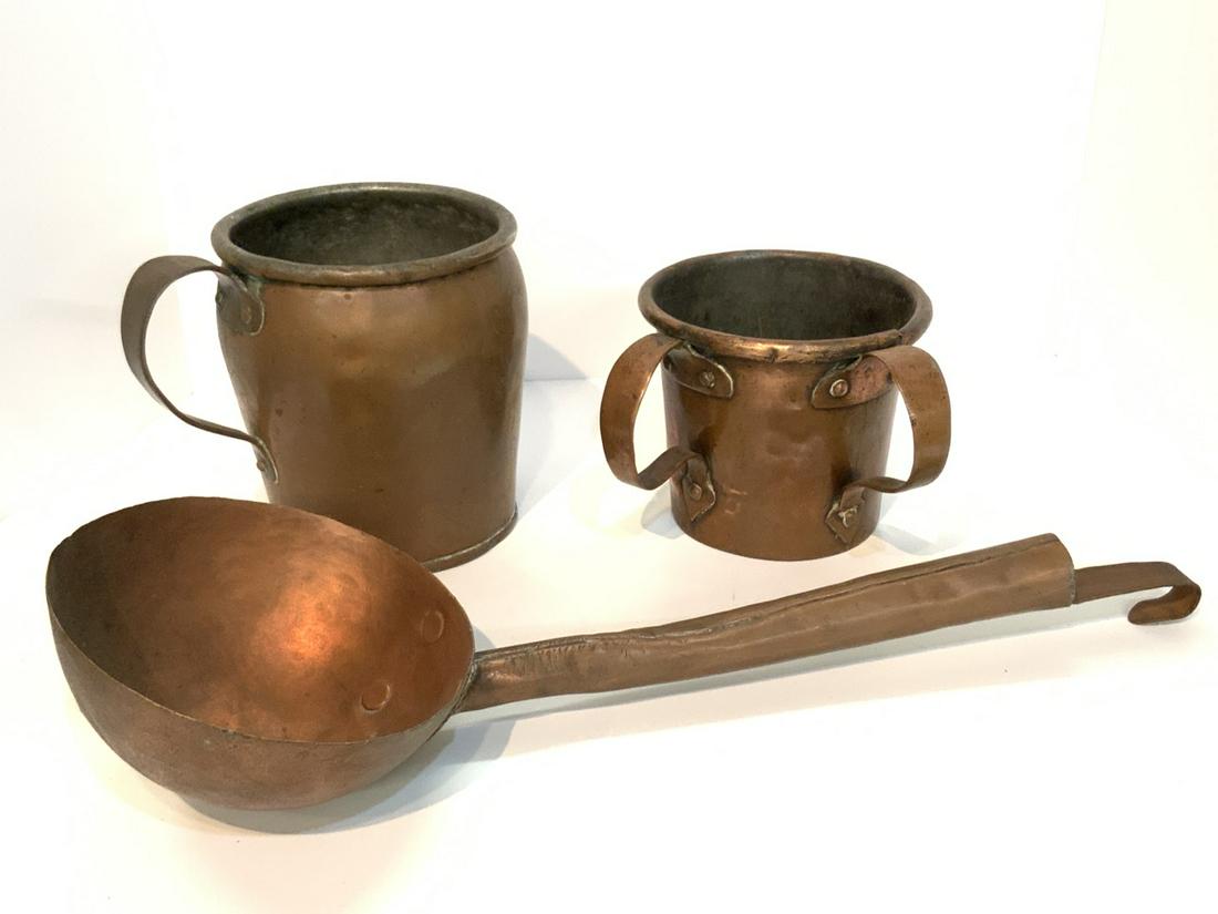 19th C. Copper Grouping: Three (3) Piece 19th century copper vessels and large ladle spoon ideal for Cauldron. Dimensions: Spoon is 19 1/2" L X 6 1/2"d and 5" X 7" and 7" x 8" cups.