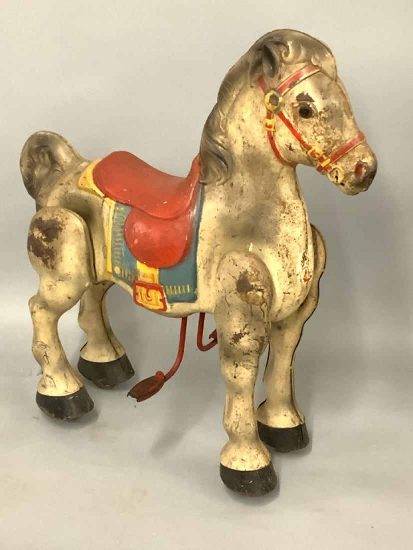 Mobo "Bronco" Metal Horse Ride On Toy: Vintage Mobo metal "Bronco" horse ride on toy. 1950's. Dimensions: 30"h X 24"L X 12" Some scribble markings seen, scratching. Overall good and functional with all parts. Please see photograph preview