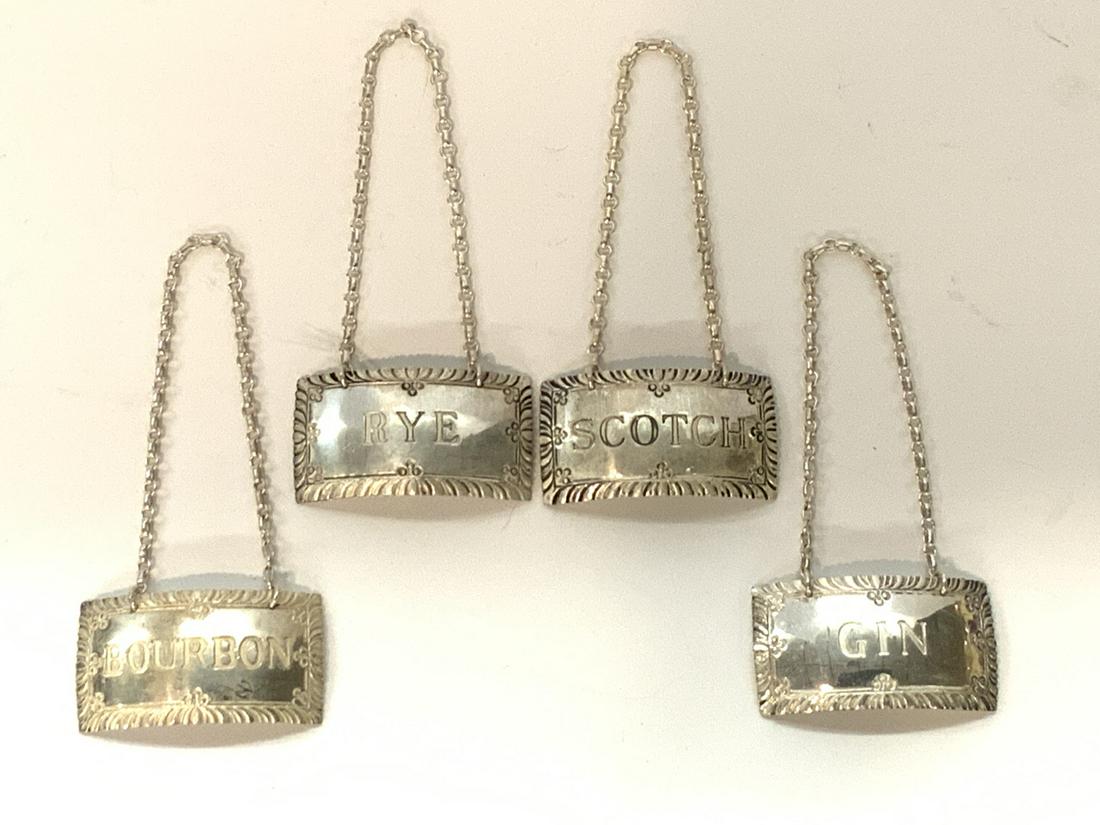 Four piece Dave sterling silver liquor tags with chain (1 of 3)