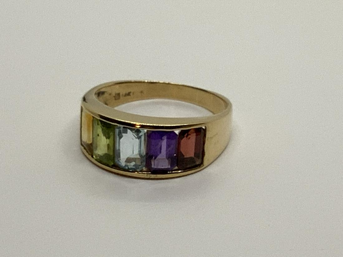 Multi gem stone ring size 8: 14k yellow gold multi-gemstone ring. Size 8 Total weight: 3.6 grams