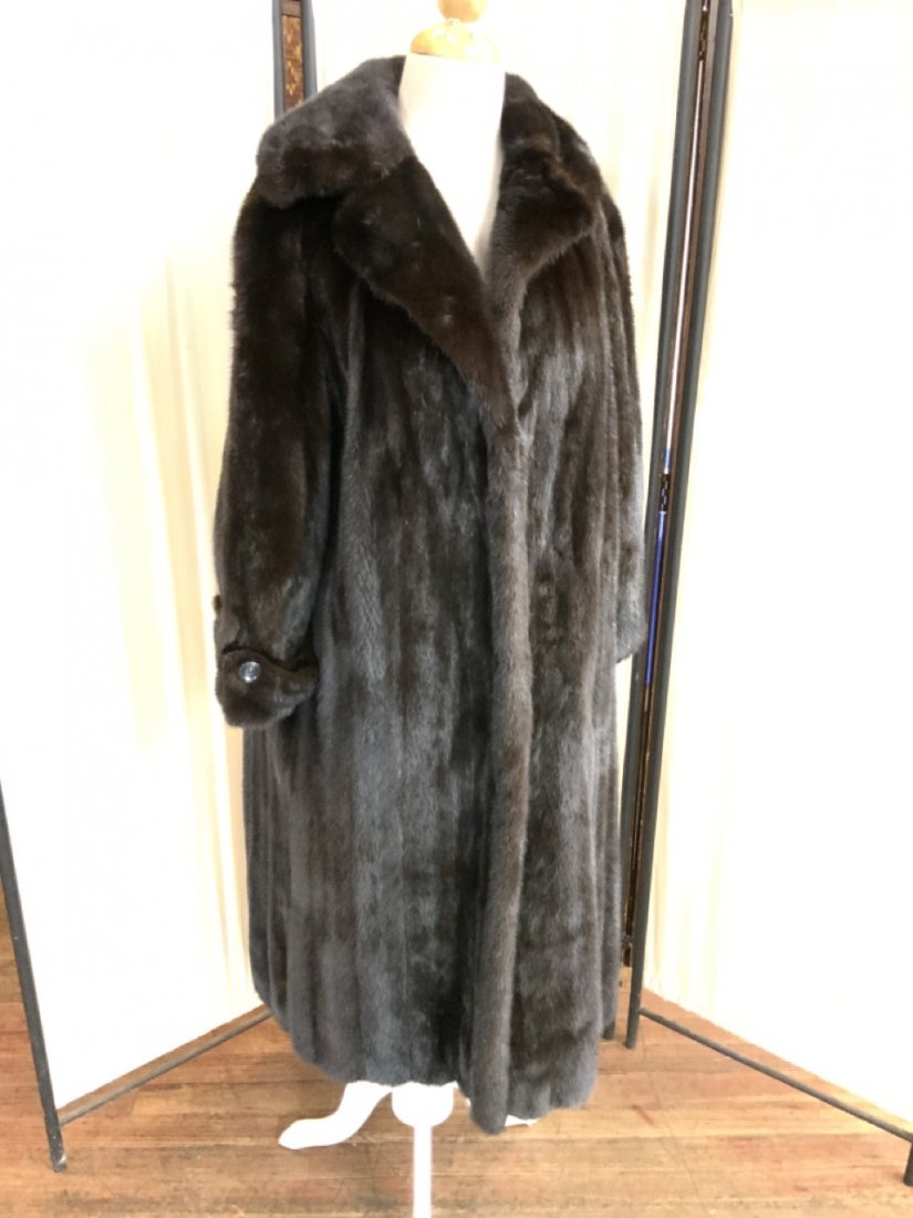 Alixandre, New York Full Length Mink Coat: Ladies full length mink coat by Alixandre Furs, New York. Dimensions: 45" long, 22" arm length. No damage. No separation. Very nice condition.