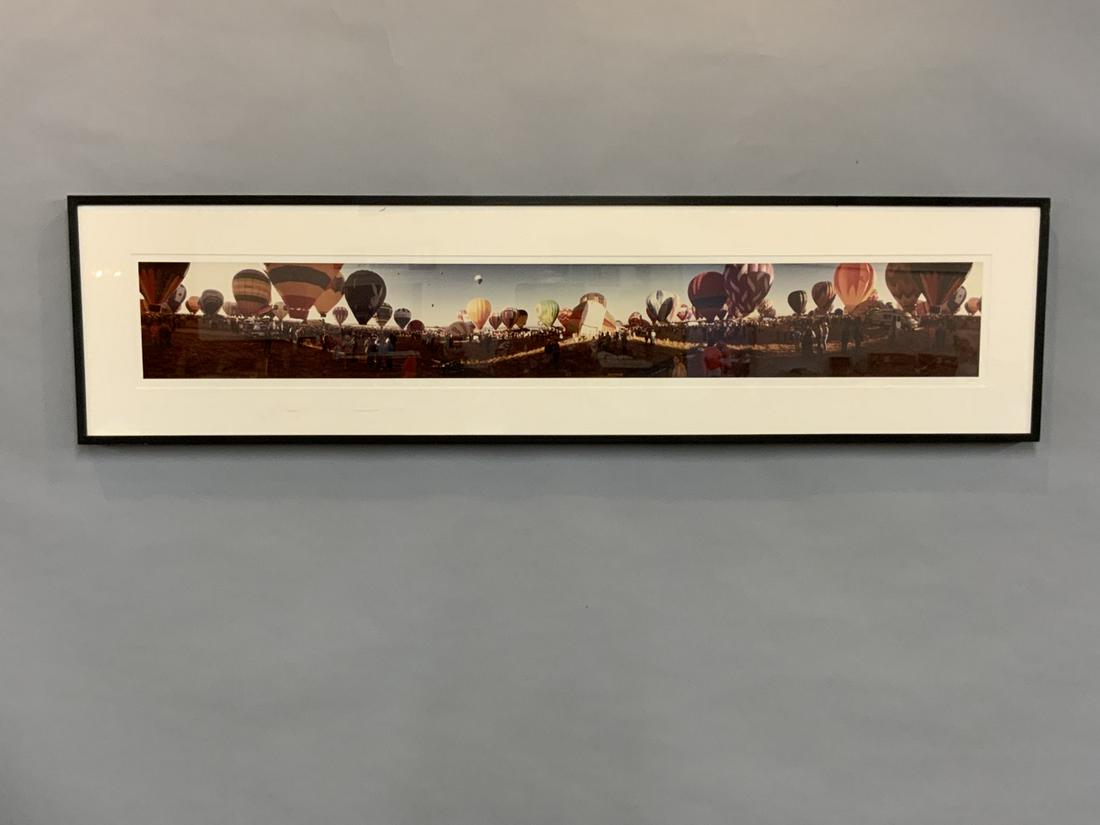 Gus Foster (American b.1940) 1981 Balloon Festival: Gus Foster (American, b. 1940) Titled 1981 Hot Air Balloon FestivalPanoramic Color PhotographSigned lower right.Dimensions: 17 1/4" X 67 1/2" Provenance: Part Of The Cushman & Wakefield Corporate Art 