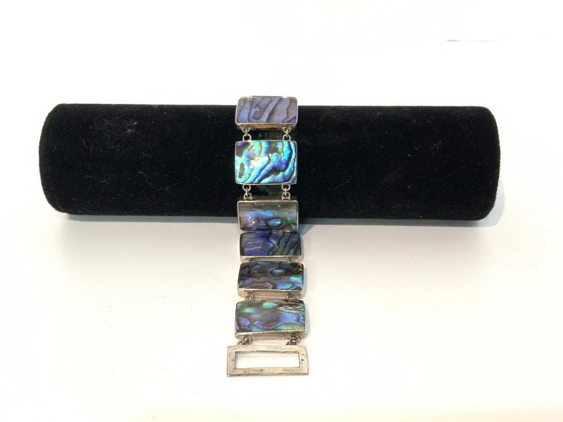 Sterling Silver Abalone Bracelet: Sterling silver abalone bracelet. 7" lengthTotal weight: 32.1 grams