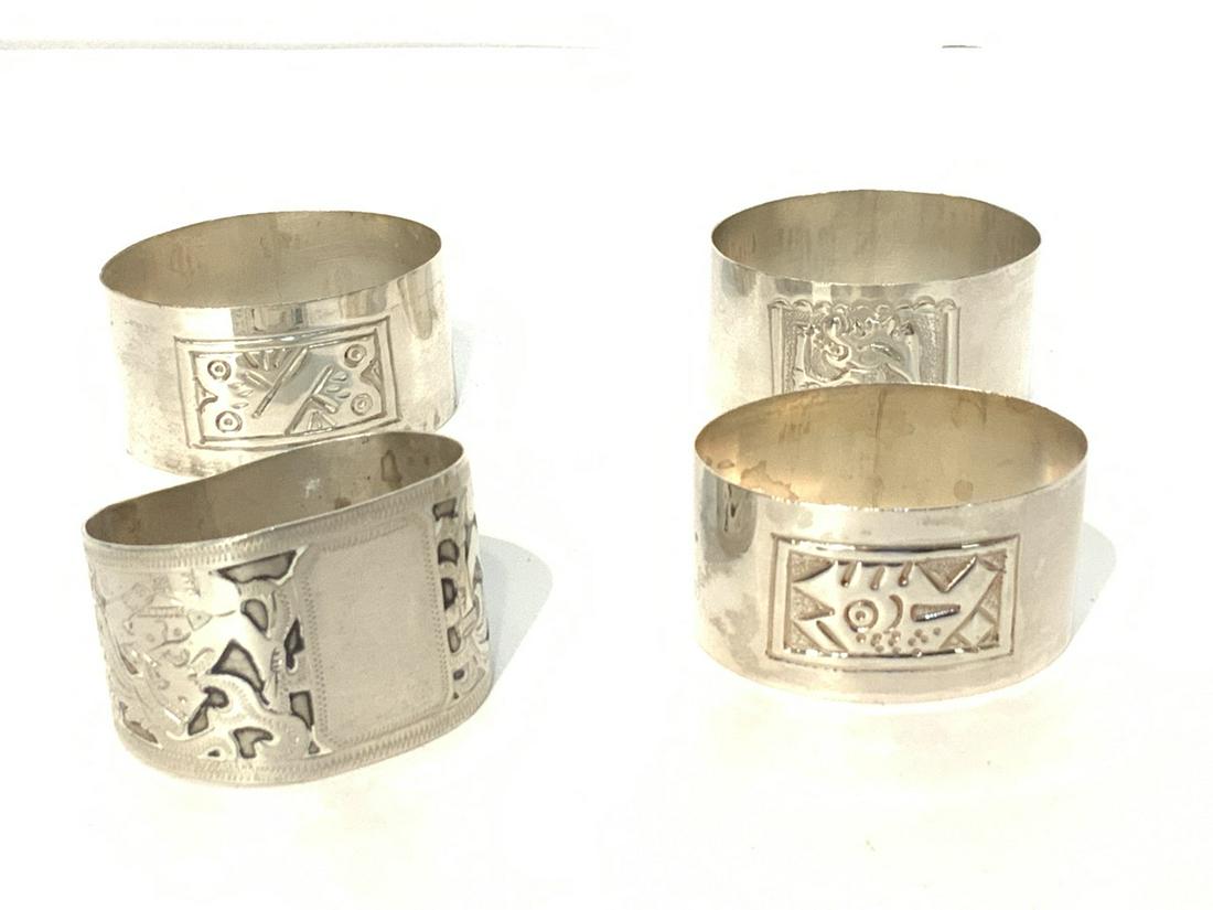 Four (4) Sterling Silver Napkin Rings, Central America: Four (4) Sterling silver napkin rings. From Ecuador and Guatemala. Total weight: 2.11 Troy Ounces