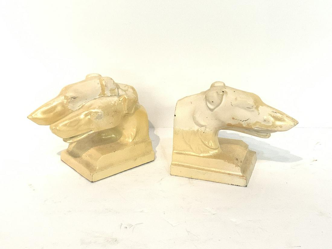 NuArt Art Deco Greyhound Bookends: NuArt Greyhound Art Deco period metal bookends. Some finish loss. Dimensions: 4 3/4"h X 6"w X 3"d
