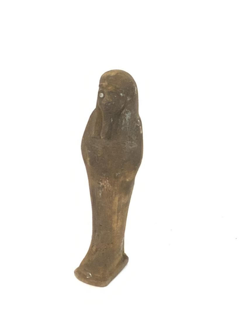 Egyptian Stone Ushabti Mummy Tomb Figure: Egyptian stone mummy. Ushabti Unknown age. Same Connecticut property as recently sold Pharoah in Flannery Sale on March 29th,2021. Dimensions: 4 1/4" X 1 1/4" X 1 1/4"
