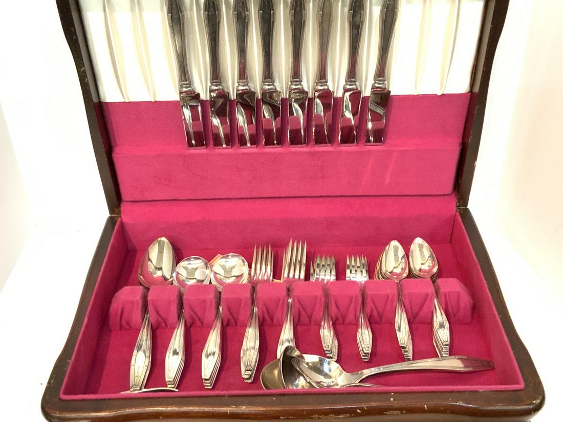 Art Deco Design Stainless Flatware: Art Deco Design stainless flatware by Simeon and George H. Rogers Company. Service for eight with serving pieces. Very fine condition.