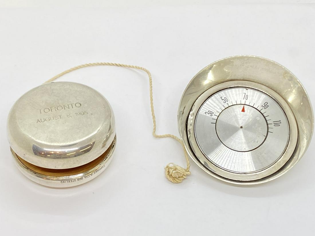 Tiffany & Co. Yo-Yo And Desk Top Thermometer, Sterling: Tiffany & Co. sterling silver yo-yo and thermometer. Yo-yo inscribed. Total weight: 6.89 ozt