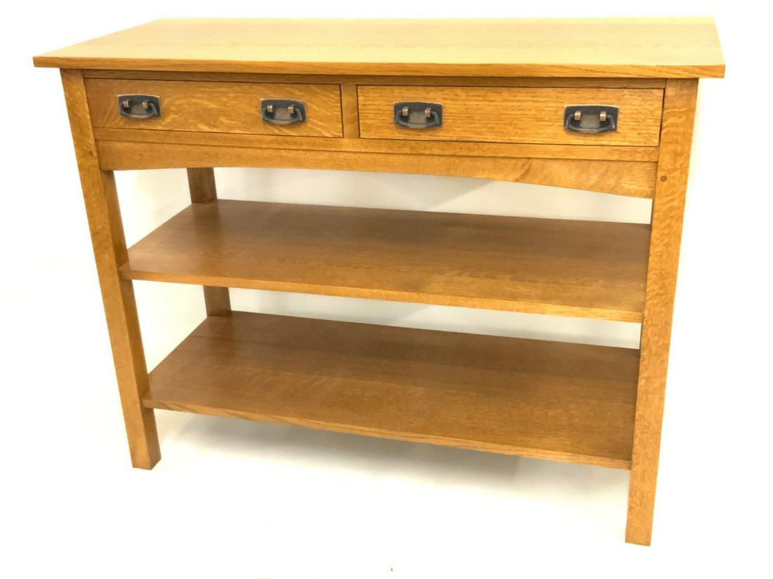 Stickley Oak Server: A Stickley furniture company Oak server. Two drawers and one being a felt lined flatware drawer. c.1999. Signed. Pristine condition. Dimensions: 33 7/8"h X 44"w X 18"