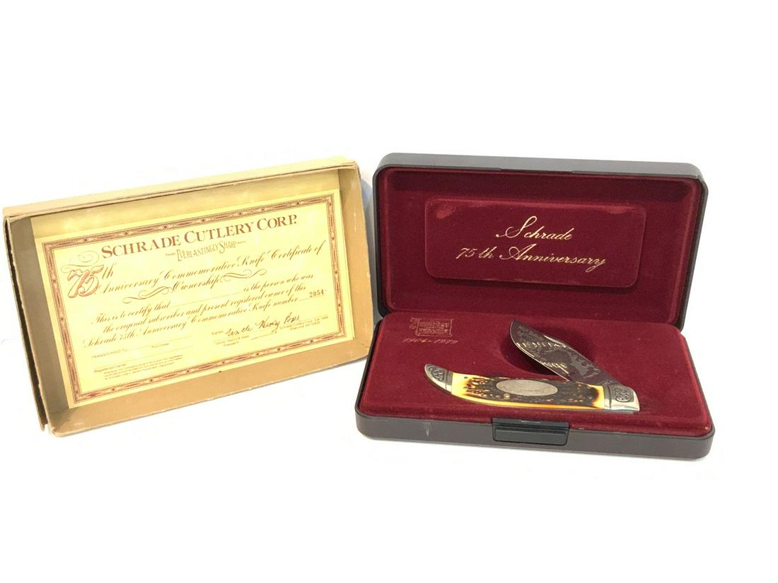 Schade 75th Anniversary Limited Edition Knife: Schrade 75th Anniversary 1904-1979 Stag handled knife. Number 2054. Dimensions: 5 1/2" length. Case lid hinge is broken. Unused knife is pristine. Please se photograph preview or call.