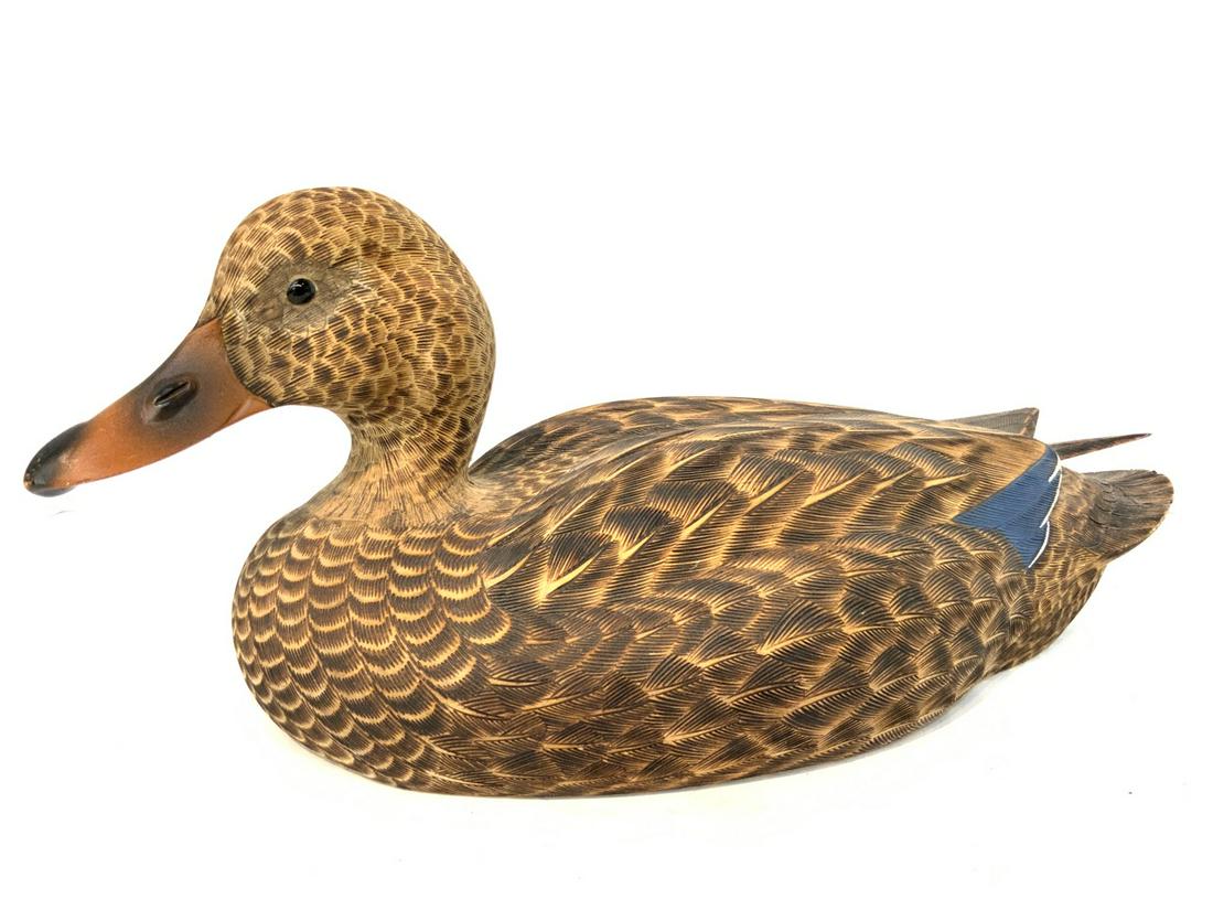 Mallard Hen Duck Decoy: Dimensions: 16” x 9” x 7”Signed “J.L Cook” Havre De Grace MD.Carved wood with glass eyes.