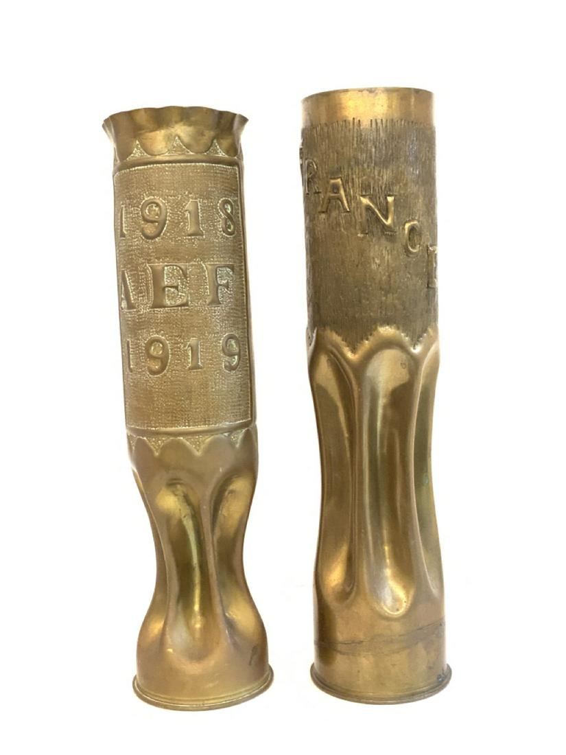 Two (2) Piece WW1 Trench Art Shell Vases: Two (2) Piece WW1 Trench Art Shell Vases France.Dimensions: 13.5” x 3 1/4” & 13 3/4” x 3”