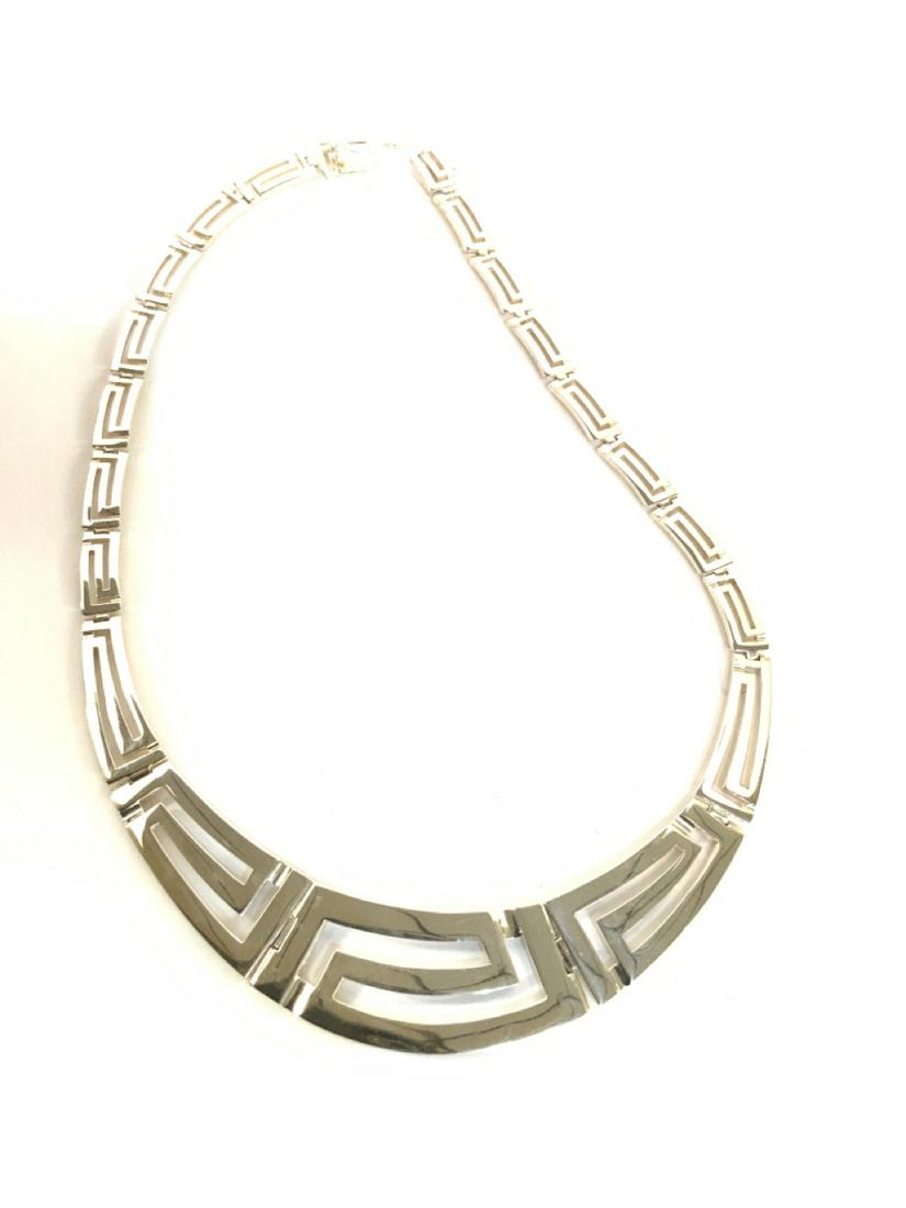 Sterling Silver Choker Necklace: Sterling silver necklace. Dimensions: 16 1/2" length Total weight: 1.4 avg. oz.