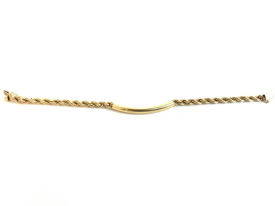 14k Yellow Gold Bracelet: 14k yellow gold bracelet. 7" length Pat 3308517 Total weight: 9.039g
