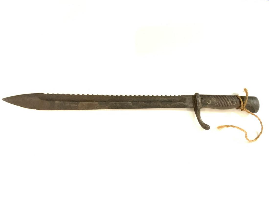 German Sawback Bayonet: German sawback bayonet. Dimensions: 19 1/2” long
