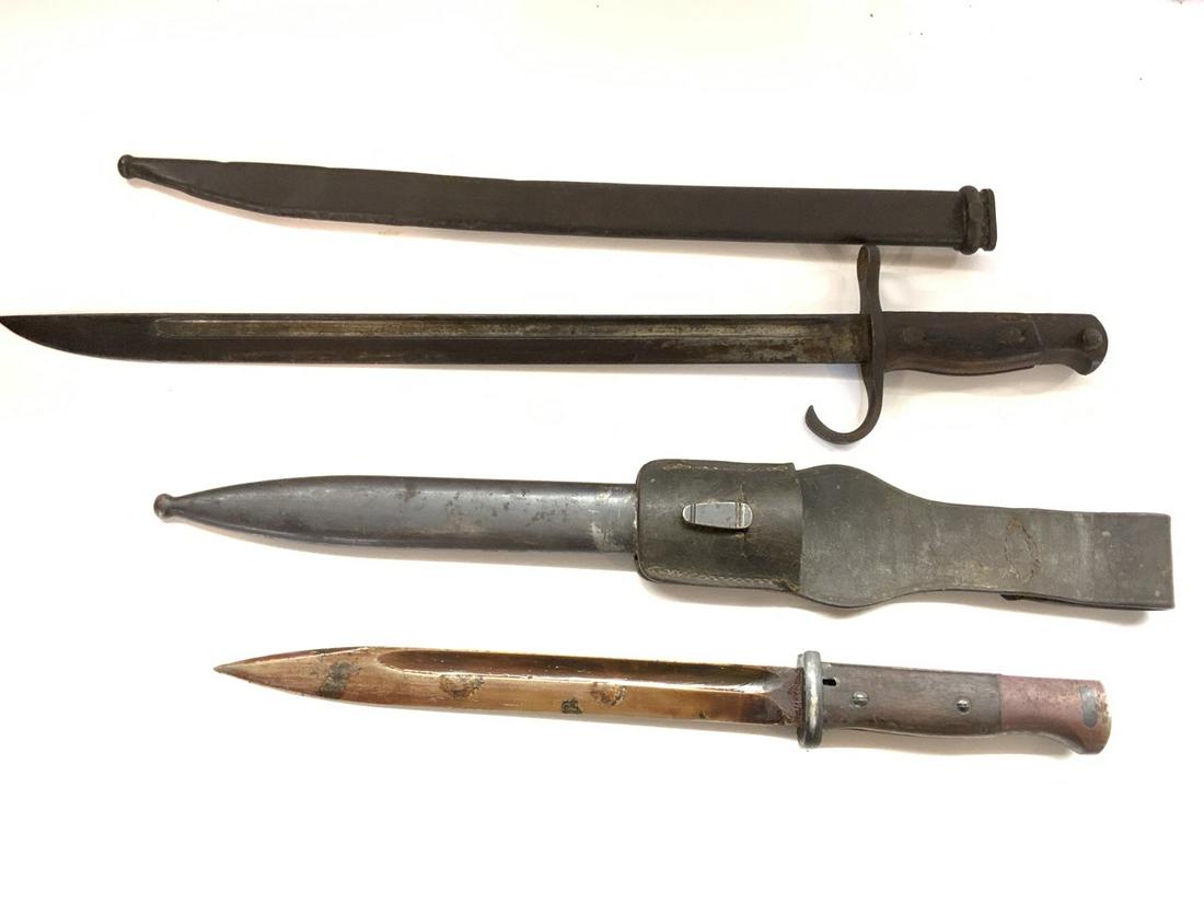 Two (2) German Bayonet Knives: Two (2) German bayonets. As seen in photograph preview. Serial #: S/2402 Serial #: 38066