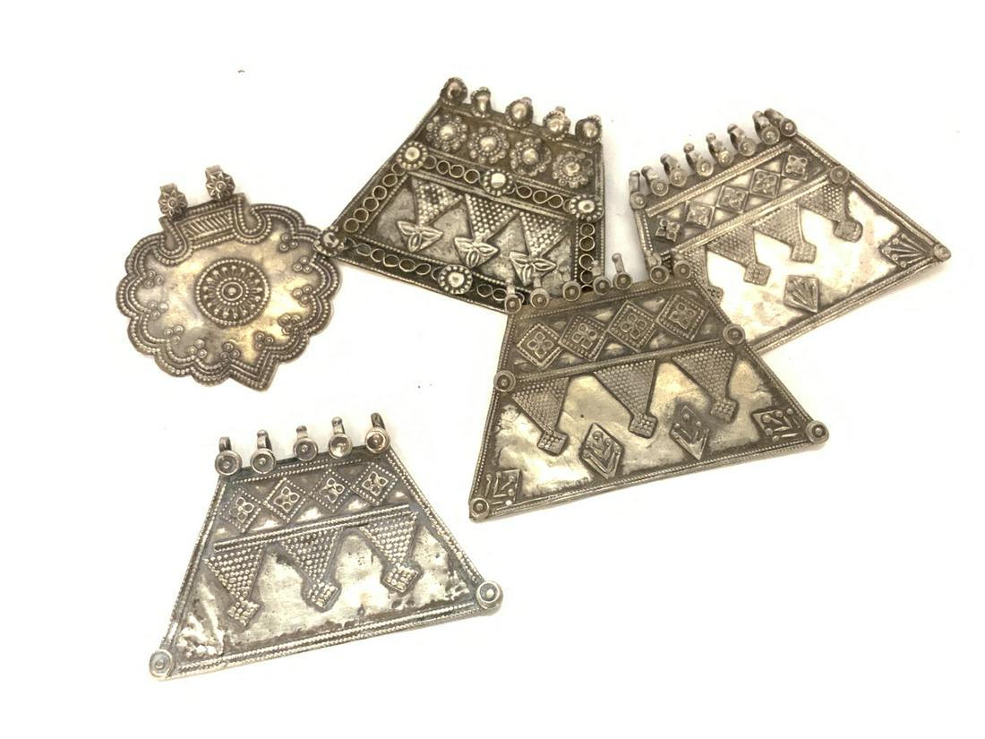 Antique Afghan Silver Amulets: Antique Afghan silver amulets. Dimensions: 2 1/2" X 3" Total weight: 3.468 troy ounces Provenance: Bergen Cty. Jewelry Collector's Estate.