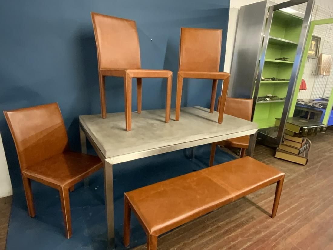 Maria Yee Designer Chairs And Concrete Table: Designer Maria Yee set of four chairs and matching bench seat accompanied with a concrete top dining table. Dimensions: 59 3/4" X 36" X 31" and 36"h X 18" X 18 1/2" and bench is 18" X 51" X 15"