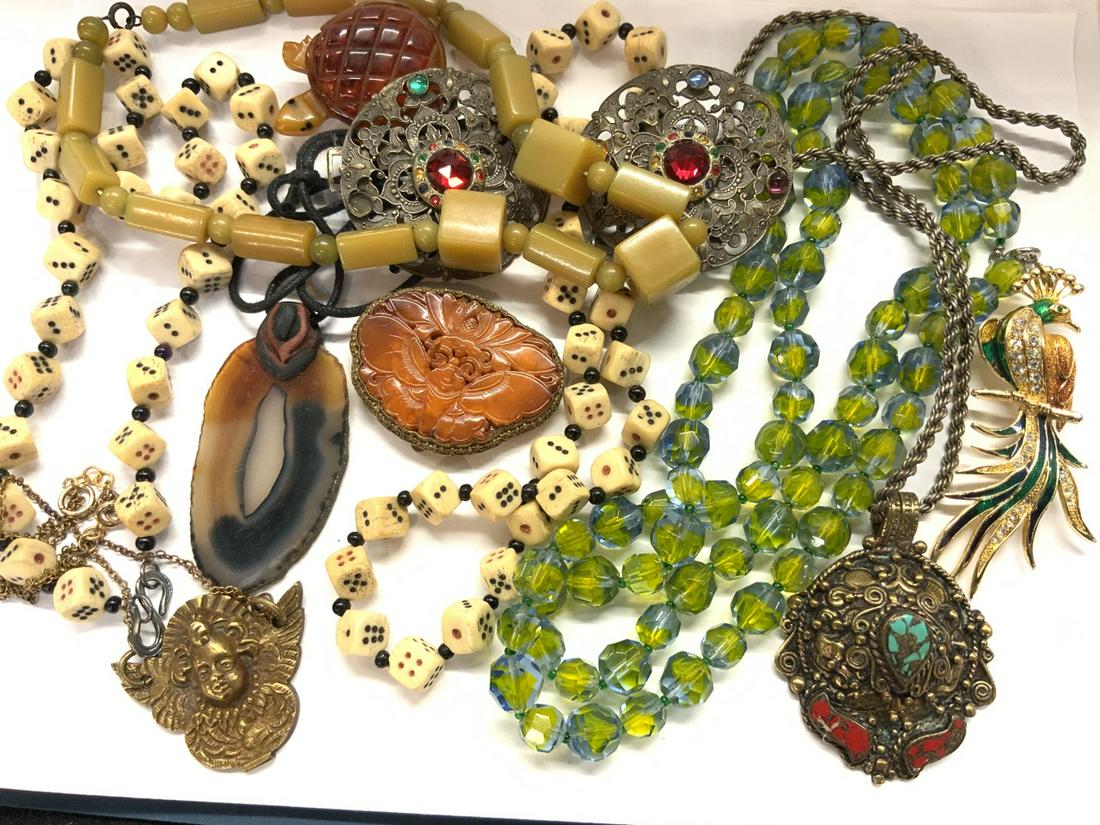 Estate Jewelry Group Lot: Assorted Jewelry lot, Glass beads, pendants, Carnelian carving, Angel pendant etc. Please see photograph preview. Provenance: Bergen Cty. Jewelry Collector's Estate. Many Purchased 1960-'s to 90's. Mo