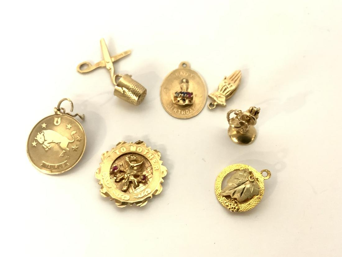 14k Gold Assorted Charms: 14kl Gold Assorted Charms. Total weight: 12.32 grams