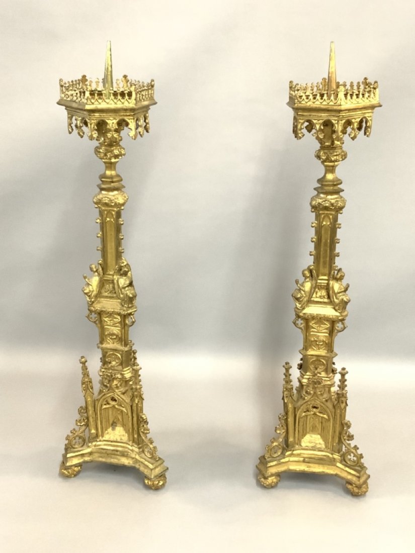 Important 19th c. Bronze Altar Sticks: A pair of 19th century Bronze altar sticks. Highly ornate with cathedral structure and praying angels. Purchased in antique shop in Paris c. 1950's. Dimensions: 43"h X 12" X 8"