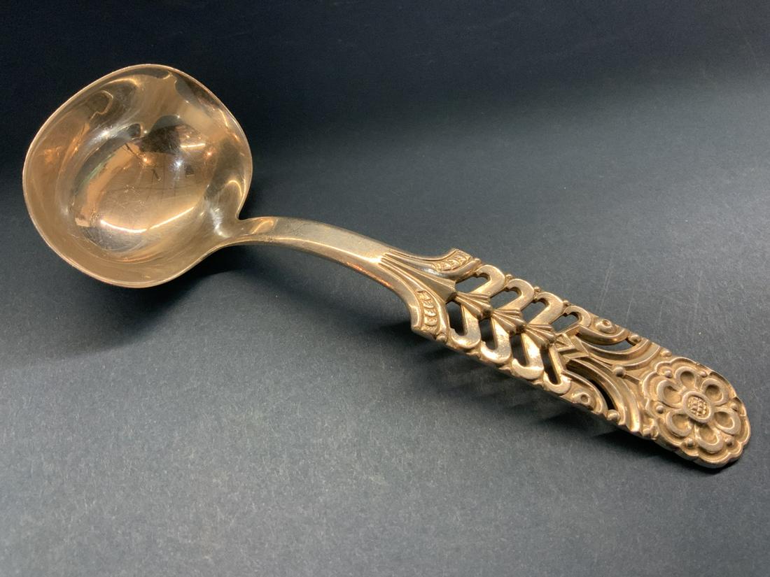 David Anderson Sterling Silver Serving Spoon: David Andersen serving spoon. Made in Norway. Total weight: 2.0051 troy ounces Dimensions: 6” x 2 1/4”