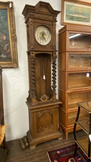 German Oak 19th c. Grandfather Clock: German Grandfather Clock. Original pendulum and weights. Oak hardwood. 19th century. Unidentified maker's marks in photograph preview. Dimensions: 87"h X 22 1/2"w X 13"d