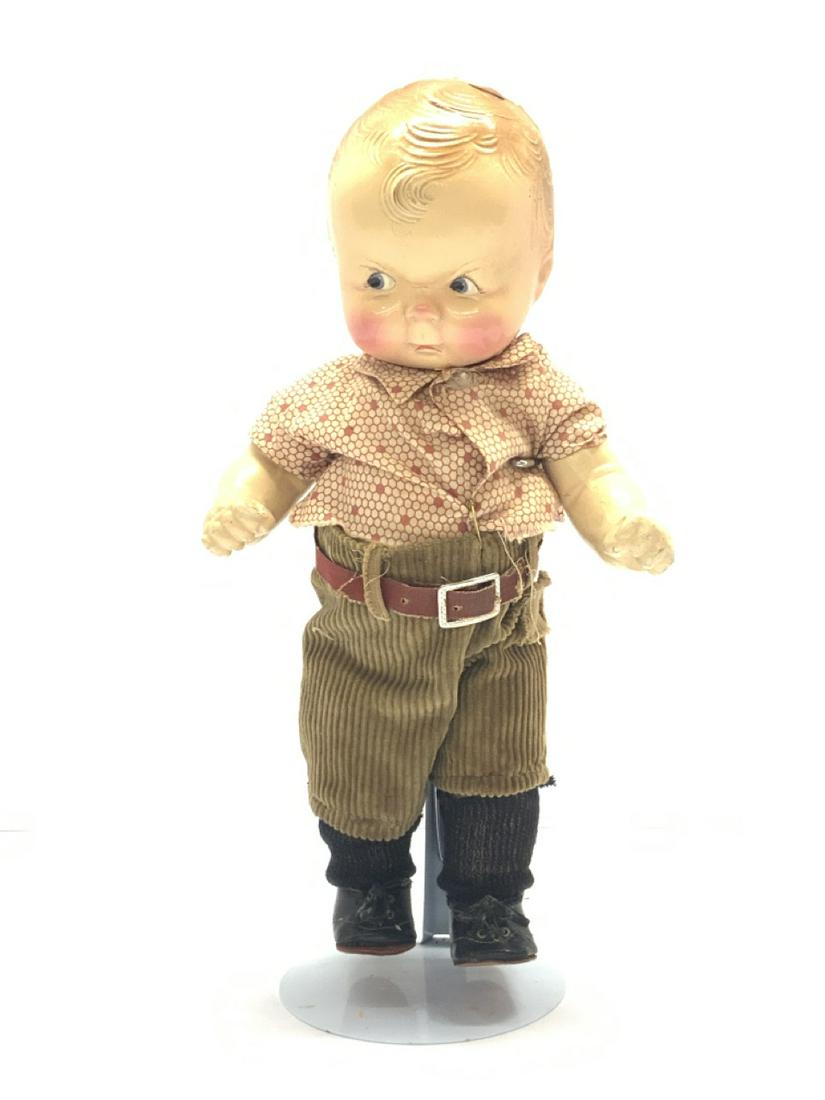 Vintage Petite Boy Doll: A rare composition singed Petite Doll Boy. Dimensions: 13” x 5”