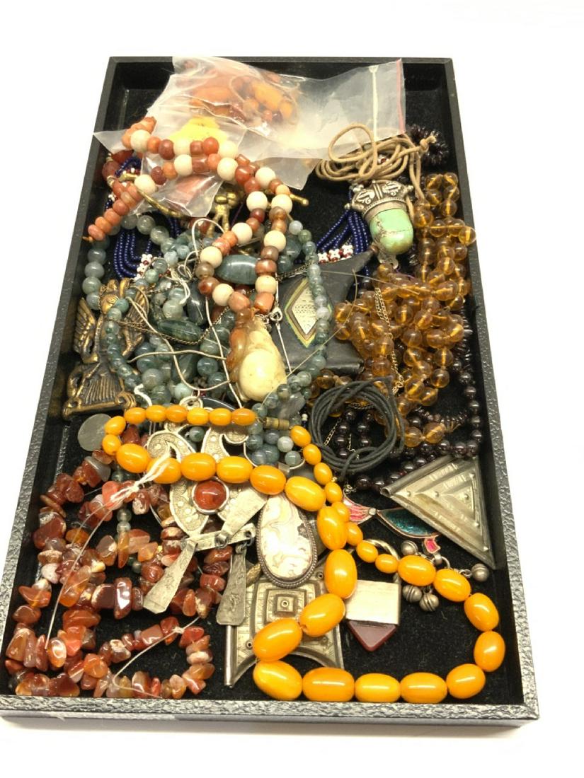 Estate Jewelry Lot: Assorted Estate Jewelry Lot,Amber, Chinese, Carnelian, Afghan and Moss Agate Etc. As seen in photograph preview.