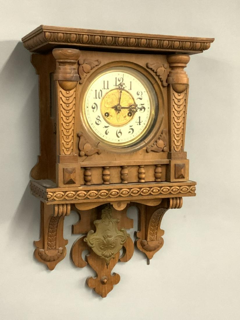 Antique Oak Wall Clock: Antique oak wall clock. Dimensions: 24" X 15 1/2" X 7 1/2"