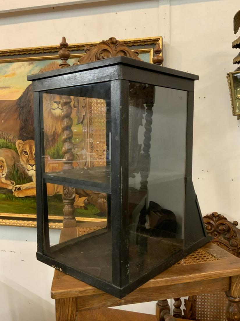 Antique General Store Counter Top Display Case: Antique general store counter top display case.Black later painted. Back has flip down lid for displensing. Dimensions: 19"h X 17" X 11 1/2"