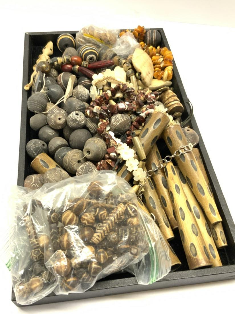 Estate Jewelry Lot: Assorted estate jewelry. Beads from Mali, Carved Wood etc.