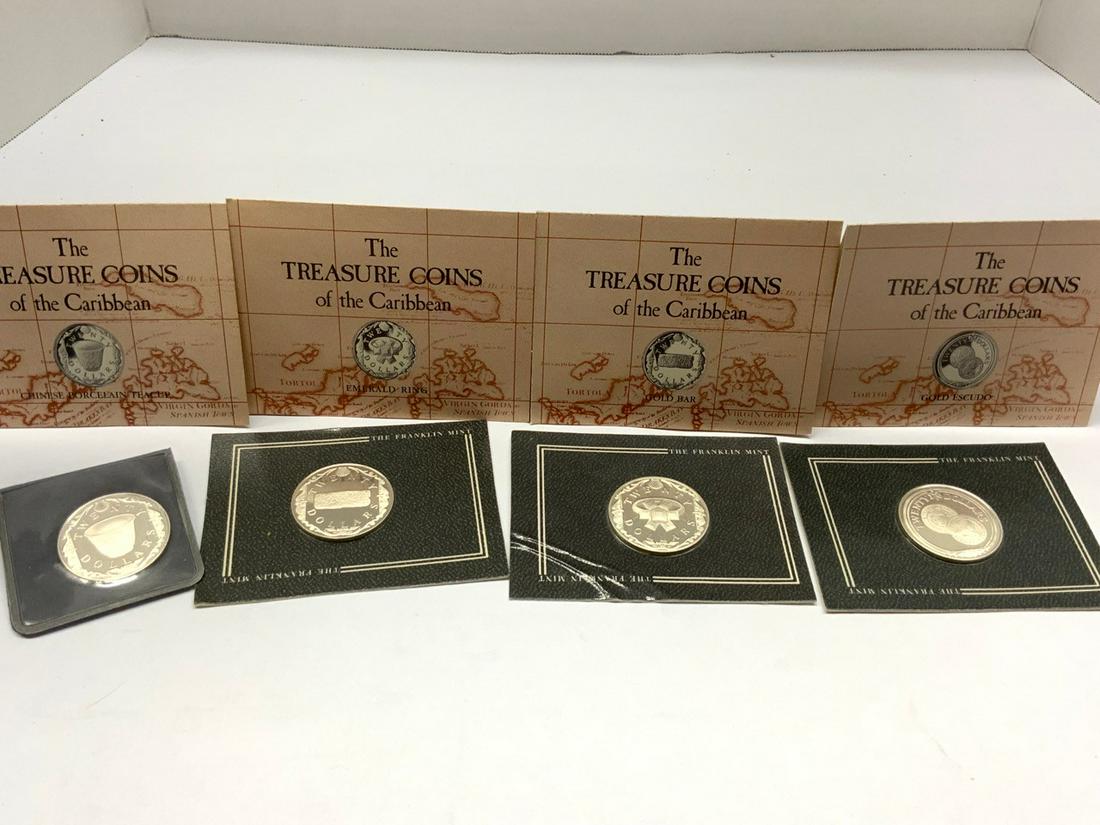 The Franklin Mint Assorted Treasures Coins Of The: The Treasure Coins Of The Caribbean issued by The Franklin Mint. A total of four coins with case.