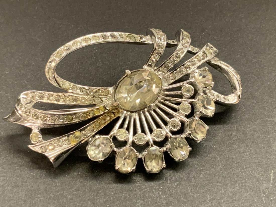 Eisenberg "ICE" Vintage Costume Jewelry Brooch Sterling Silver: Vintage Eisenberg "Ice" sterling silver costume jewelry brooch. Dimensions: 1 3/4" X 2 1/2" Signed reverse, some soiling, all stones present, some stones clearly look like older done replacements appr