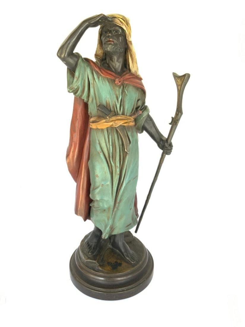 Cold Painted Bronze Arab w/ Sword: â€˜Cold painted bronze statue of Arabian man with sword. Probably Austrian late 19th or early 20th century. Dimensions: 18”h x 9"