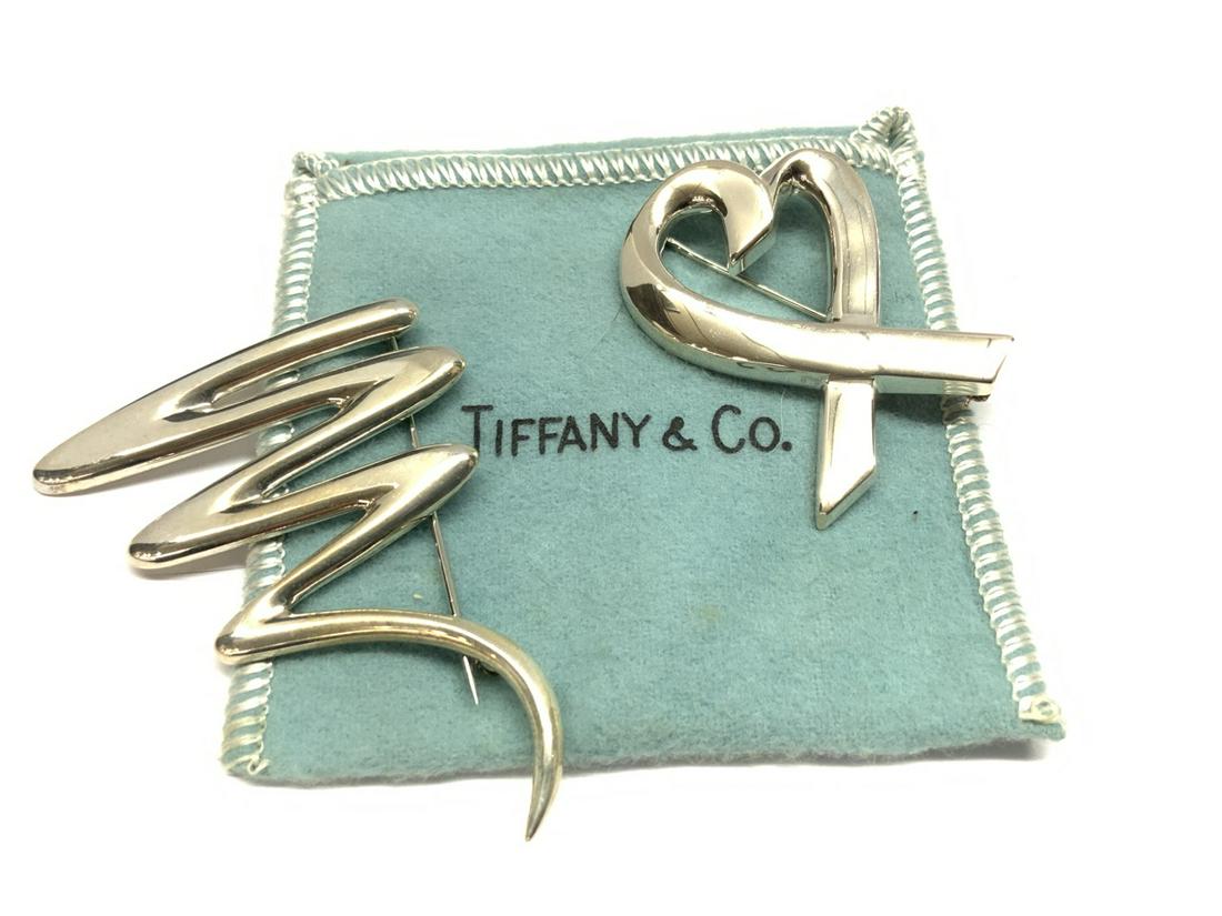 Two (2) Tiffany & Co. Paloma Picasso Pins: Two (2) Sterling silver Tiffany & Co. Paloma Picasso PinsDimensions: 21/2” x 2” and 1 2/4” X 1 3/4