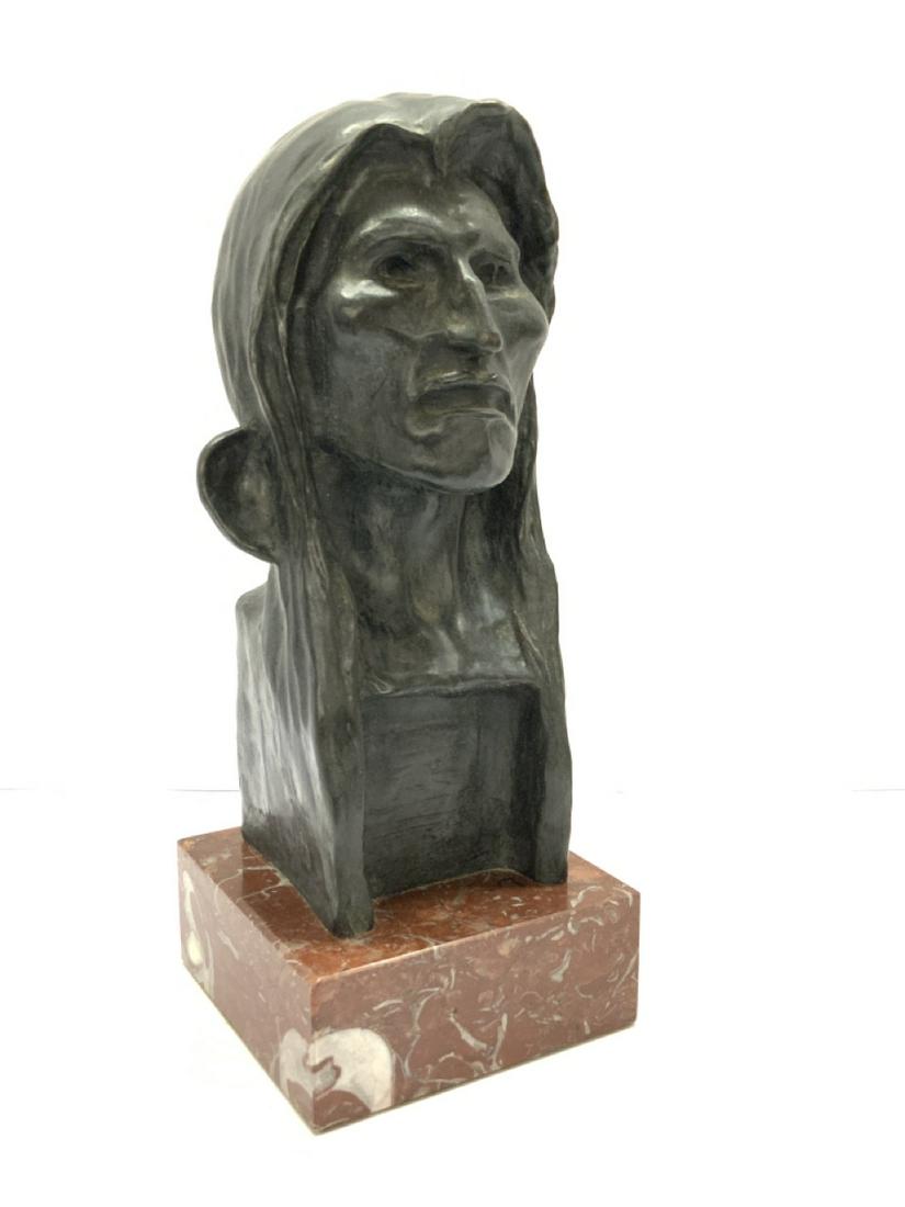 Aft. Frederick Remington 1908 "The Savage" Bronze Bust: Aft. Frederick Remington Bronze Indian Bust.Titled: The Savage c.1908Mounted on a sienna marble base. Dimensions: 13" X 5" X 5"