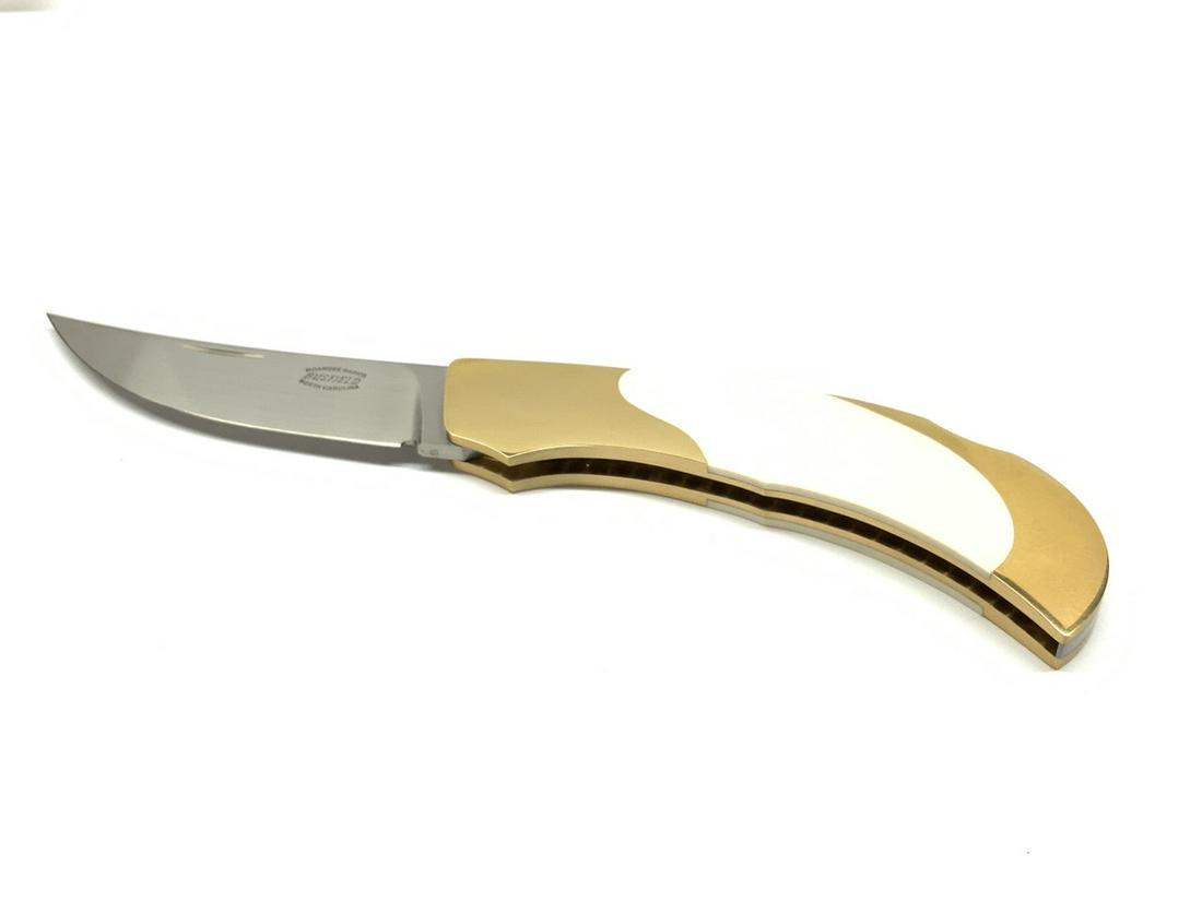 Jack Busfield 18k Gold Rearlock Trailing Point Blade: Jack Busfield Rearlock Trailing Point Blade Knife. Custom with 18k solid gold handle with bone inlay. Documented c.2003. Dimensions: 6” length overall approx.