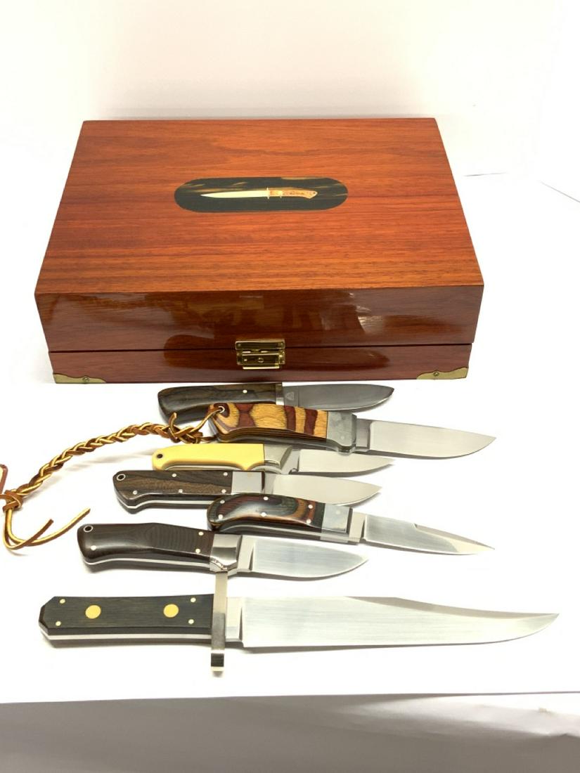 Seven (7) Piece Custom Exotic Wood Handled Fixed Blade Knives: Seven (7) piece custom knife collection with case to house smaller knives..Dimensions: 8”-13 1/2” lengthsProvenance: Single owner estate collection. Family wishes to see this collection of