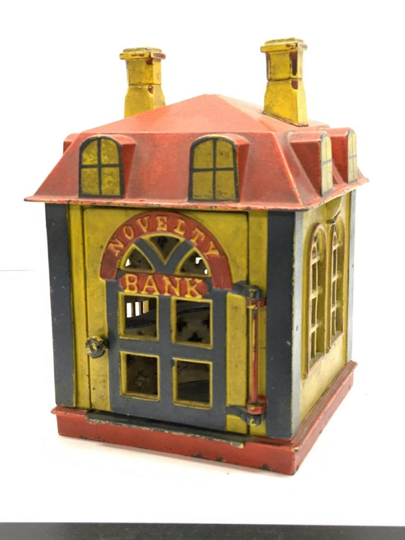Antique Novelty Cast Iron Bank by Stevens: Novely Cast Iron Mechanical Bank by Stevens. Missing figure inside. Excellent paint. Dimensions: 6 3/4" X 5" X 4 1/2"