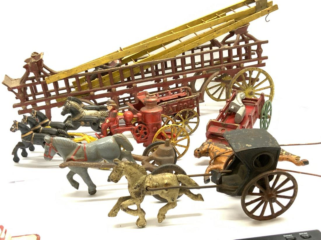 Cast Iron Toys Lot Horse Drawn Fire Toys: Cast iron Horse Drawn Fire Toys. As Is. Some damage.