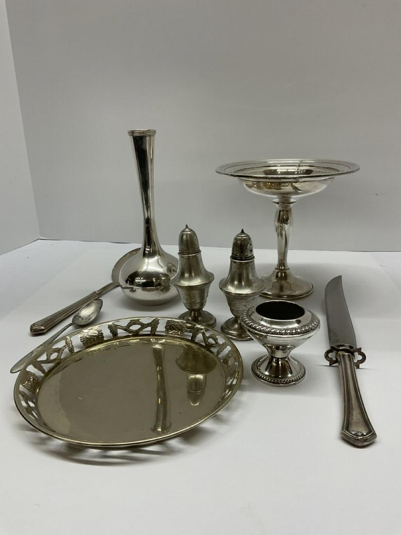 Sterling Silver Serveware Lot: Compiled sterling silver table wares. Total weight: 1lb 12.5ozSome pieces are weighted.Knife has Sterling handle and stainless steel blade
